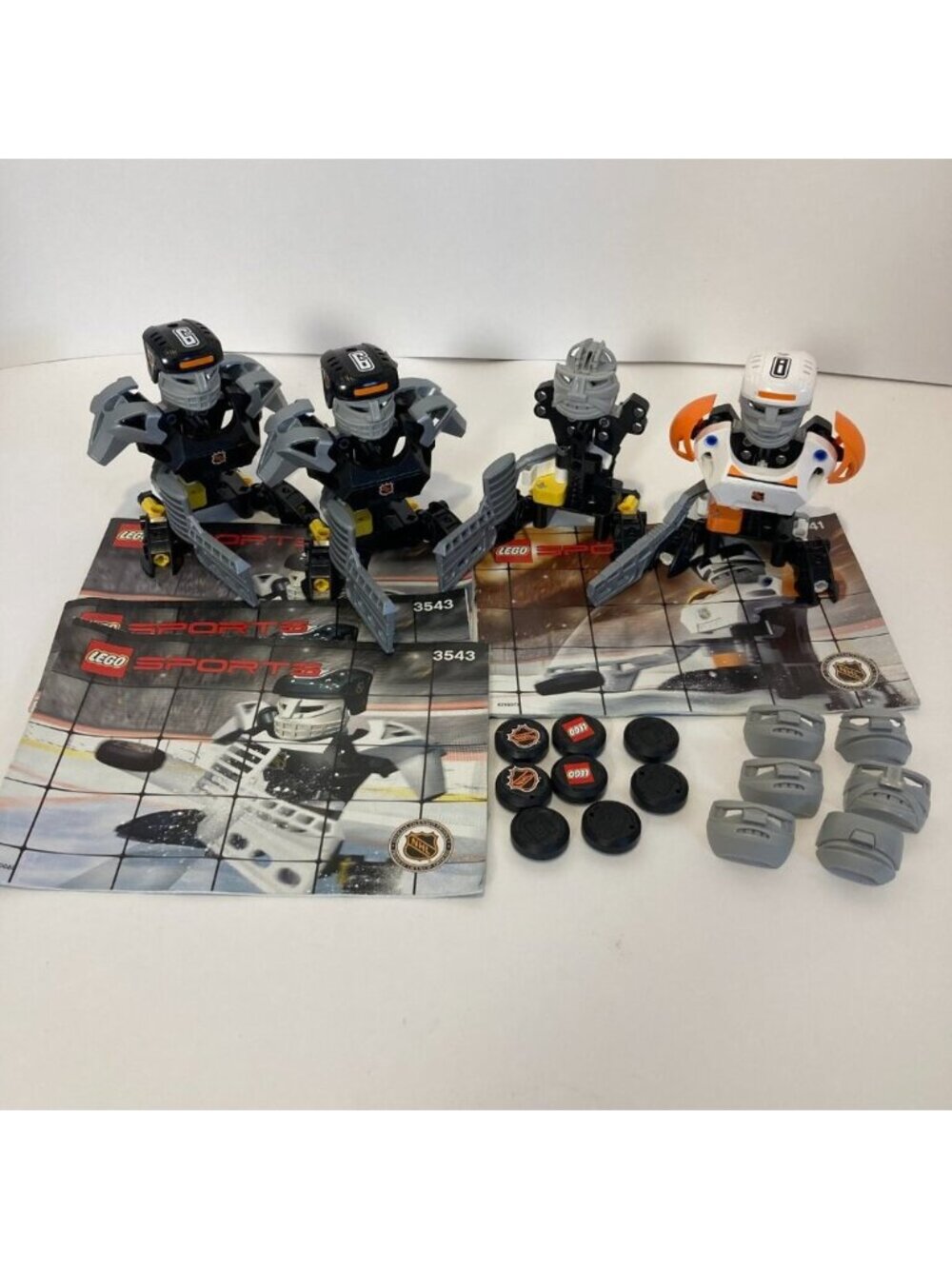 LEGO Sports Lot of 4 Buildable Hockey Figure Slap Shot NHL 3541 3543 With Manual